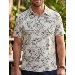 Visitor brand men's premium polo shirt featuring an allover tropical palm leaf M